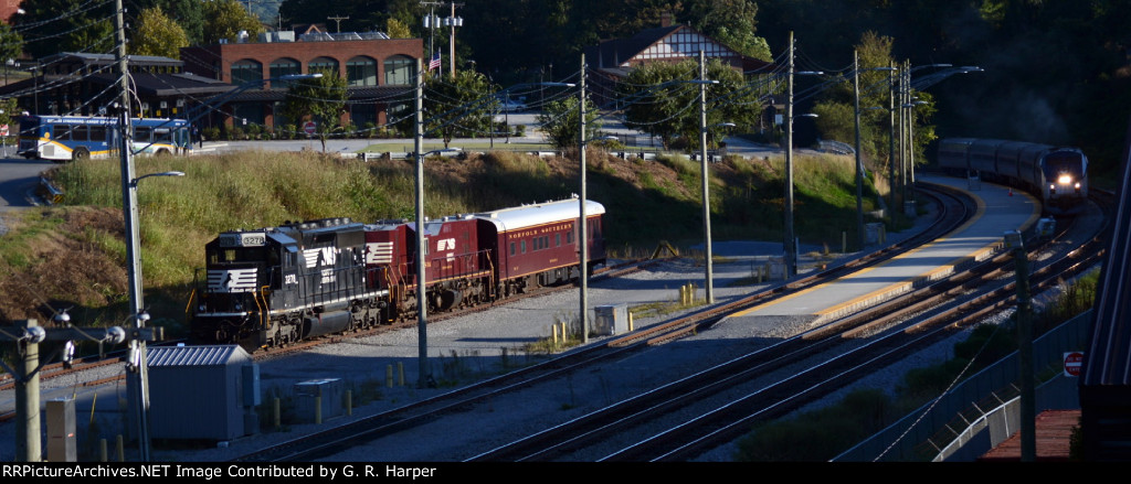 A Greater Lynchburg Transit Company bus, the NS research train and Amtrak train 66